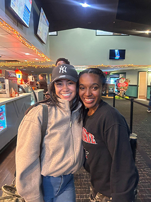 two students in lobby of theater