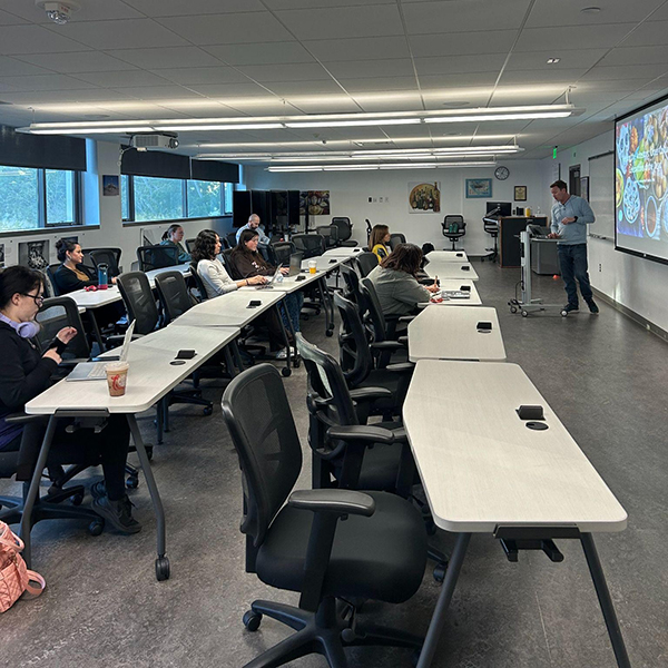 man giving lecture in classroom